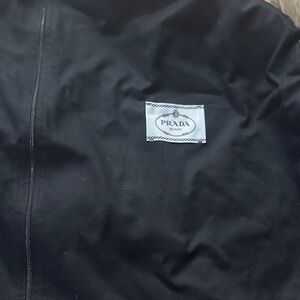 Prada navy garment bag with White Logo Patch